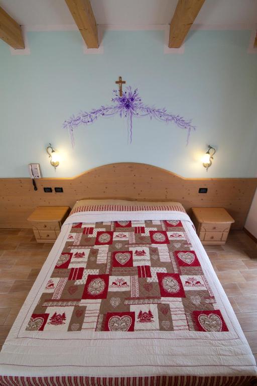 Postel nebo postele na pokoji v ubytování Hotel Sport