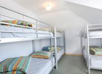 Postel nebo postele na pokoji v ubytování Narrara Backpackers Hobart