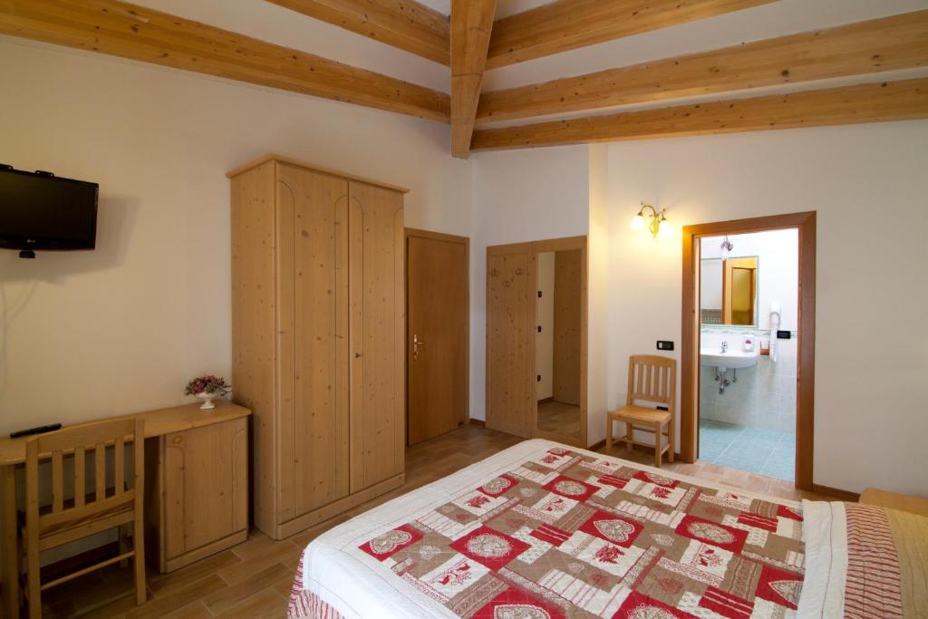 Postel nebo postele na pokoji v ubytování Hotel Sport