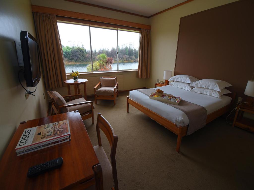 Postel nebo postele na pokoji v ubytování Hotel Naguilan