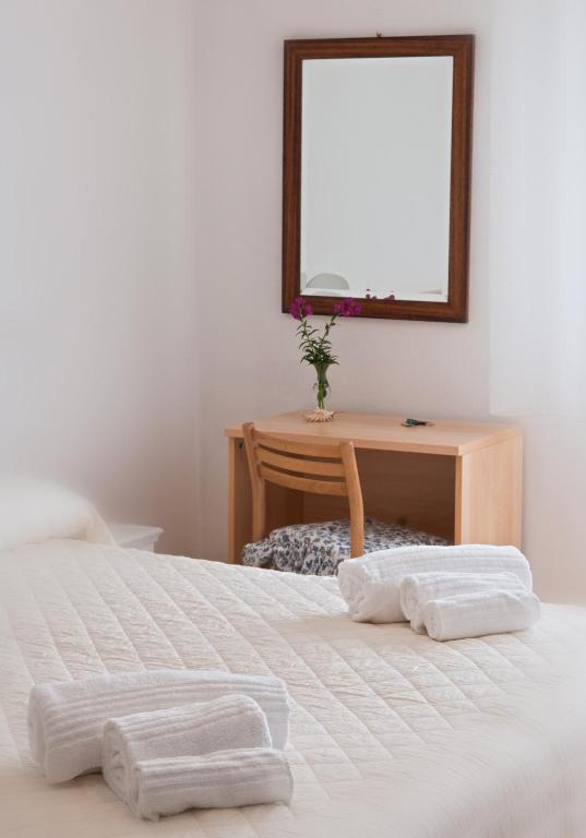 Postel nebo postele na pokoji v ubytování Hotel Elisabetta