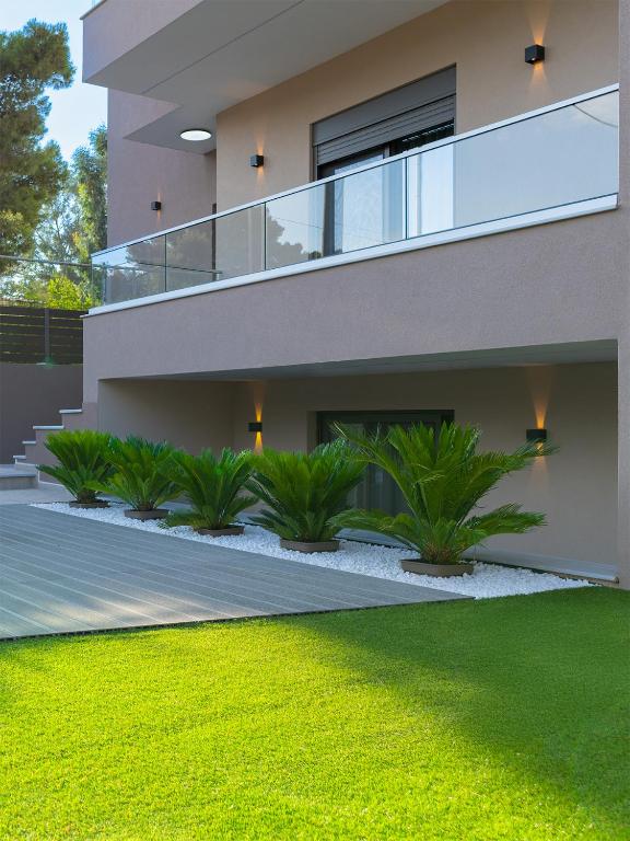 Κήπος έξω από το Davi Apartments