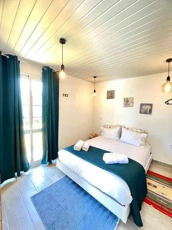 Ένα ή περισσότερα κρεβάτια σε δωμάτιο στο Home Thomas