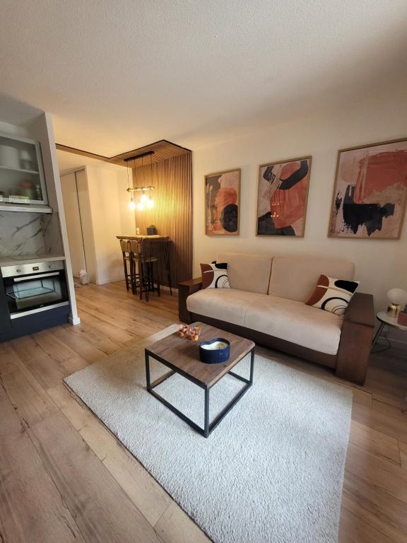 Et opholdsområde på Appart avec jardin proche mer