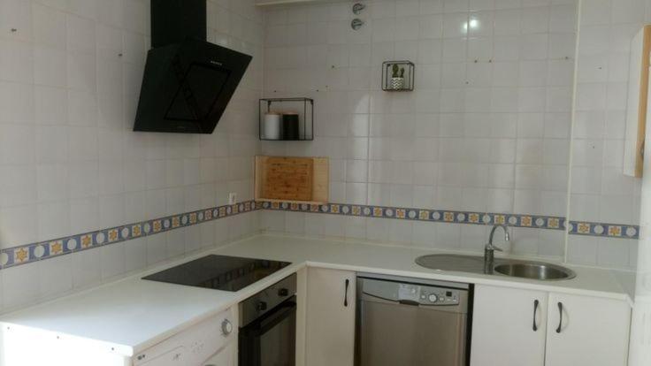 a kitchen with a sink and a counter top at Adosado tres habitaciones, en Bahía de la Plata, Zahara de los atunes in Zahara de los Atunes