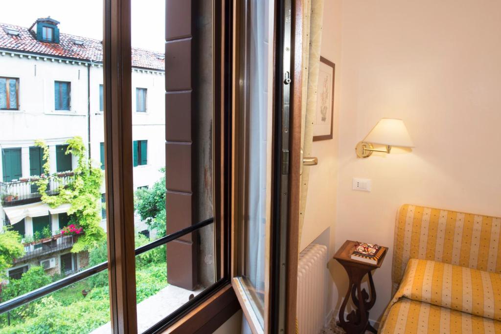 Posezení v ubytování Hotel Agli Alboretti