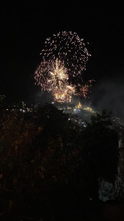 a firework display in the sky at night at v SOUL HOUSE CENTRO, GUANAJUATO in Guanajuato