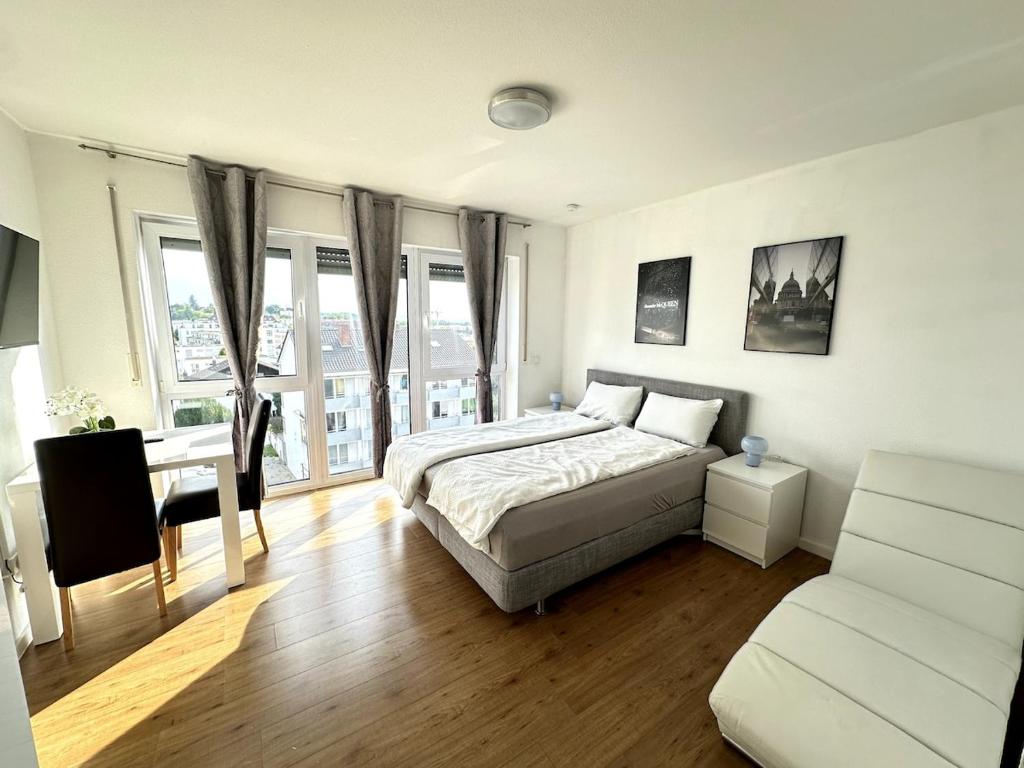 Giường trong phòng chung tại City Apartment mit Schlossblick