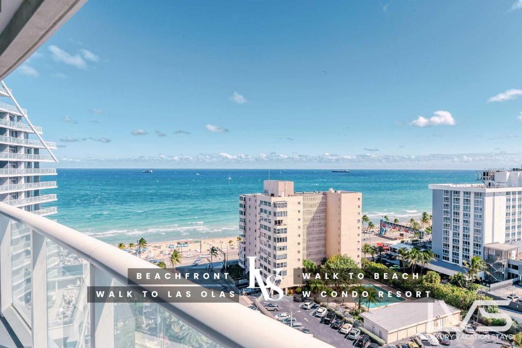 a view of the ocean from the balcony of a building at W FTL 1409 Beachfront Resort 2 Bedroom & 2 Bathroom Condo in Fort Lauderdale