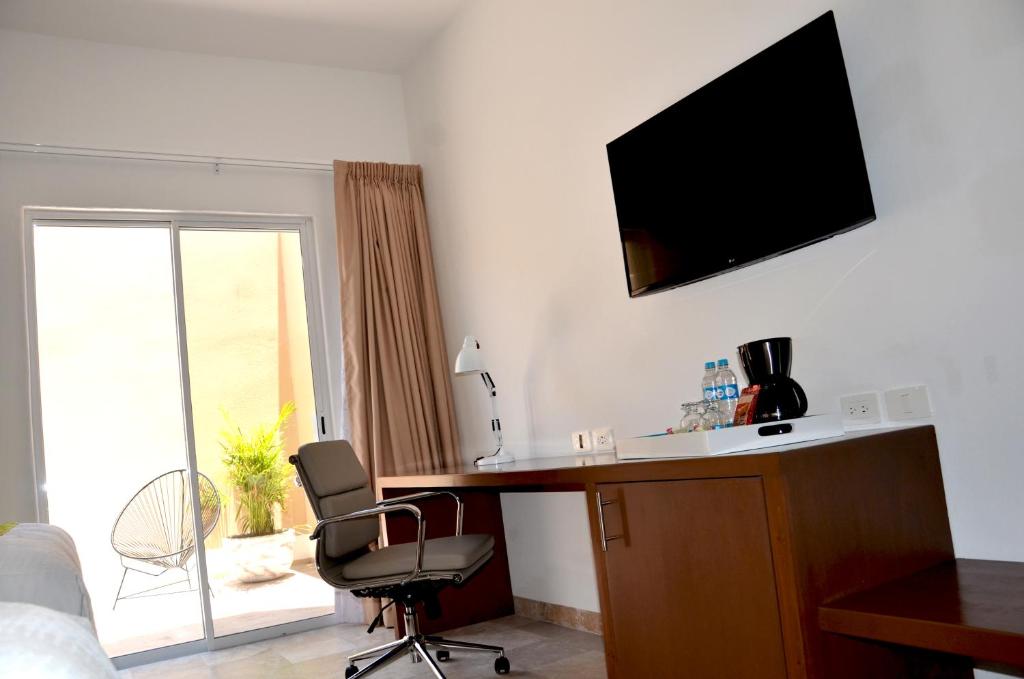 TV a/nebo společenská místnost v ubytování Hotel Catedral La Paz