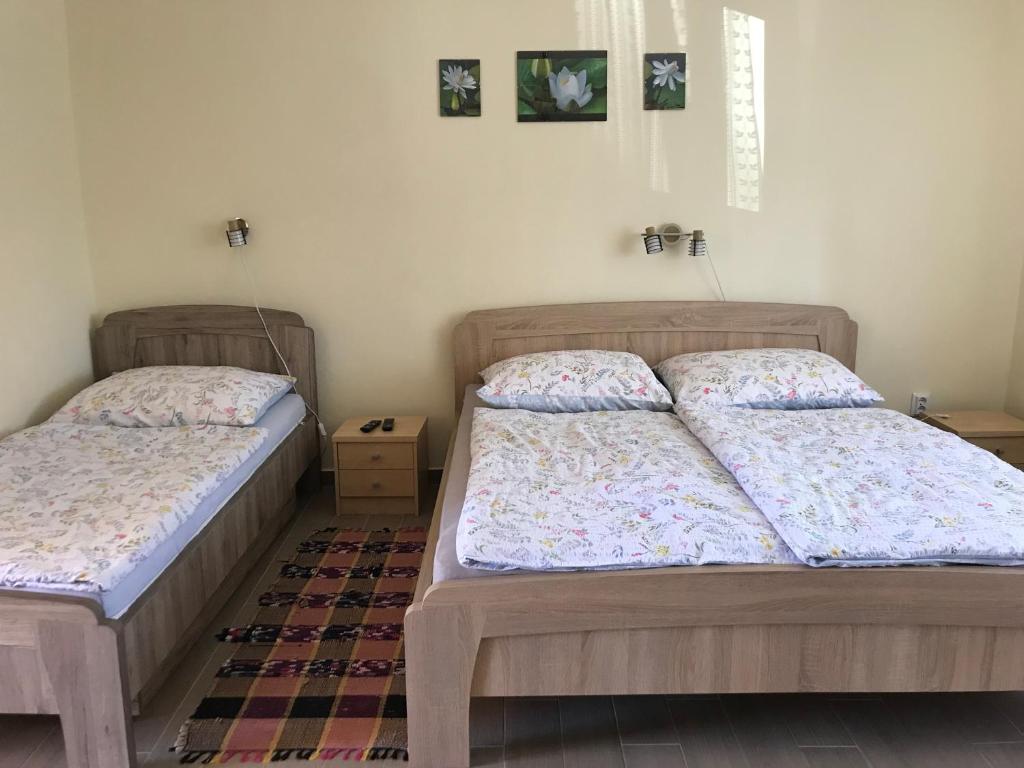 Postel nebo postele na pokoji v ubytování Diána-Vendégház