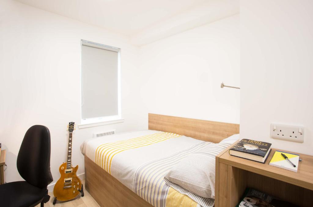 A bed or beds in a room at UHI Fort William - Campus Accommodation