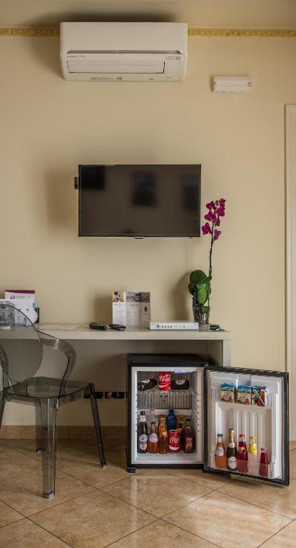 TV a/nebo společenská místnost v ubytování Airport House B&B