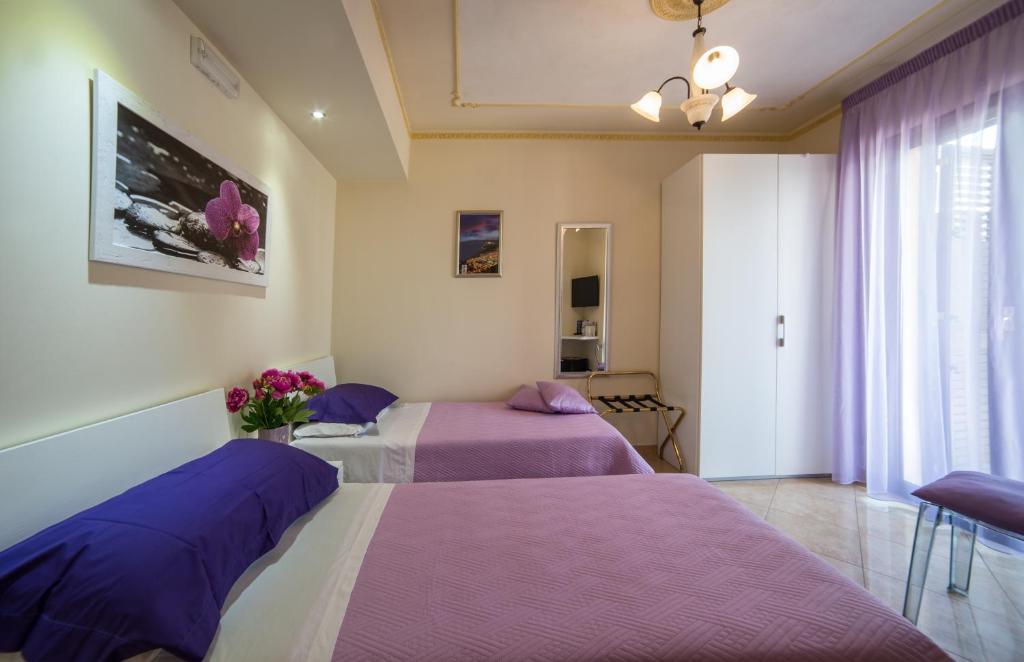 Postel nebo postele na pokoji v ubytování Airport House B&B