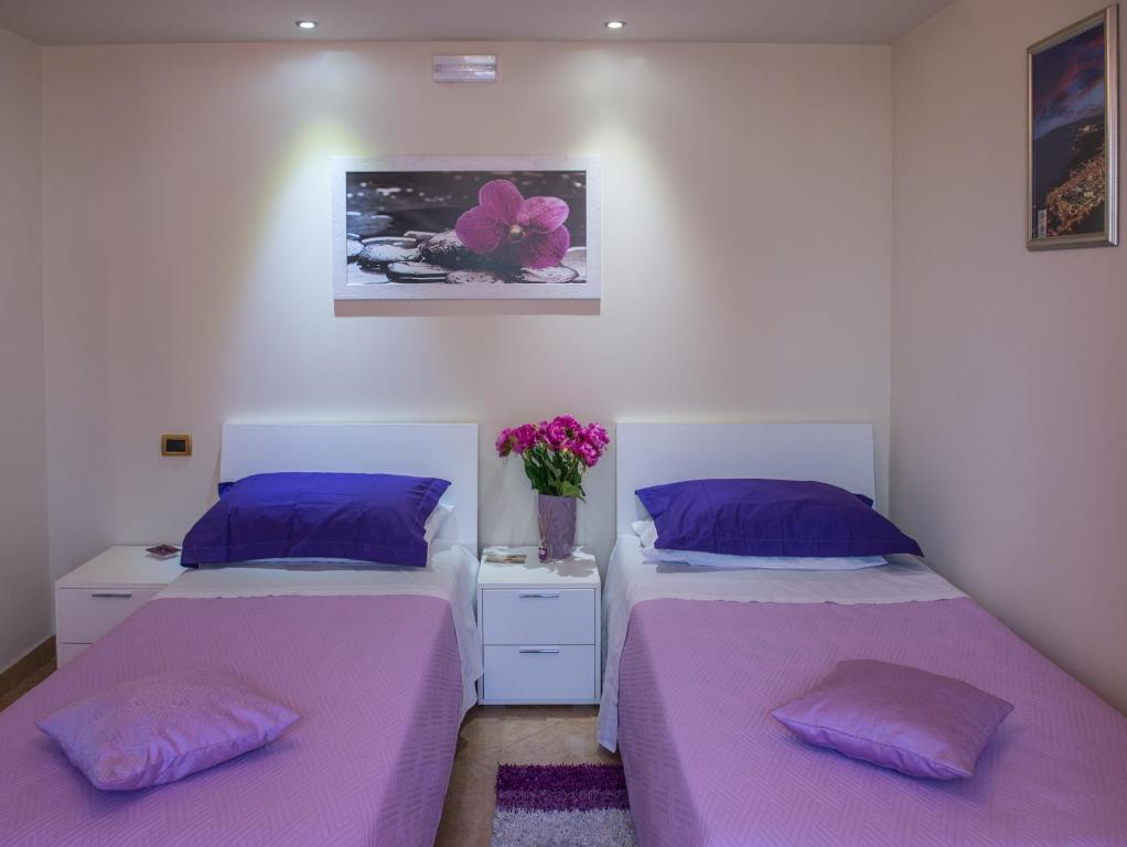 Postel nebo postele na pokoji v ubytování Airport House B&B