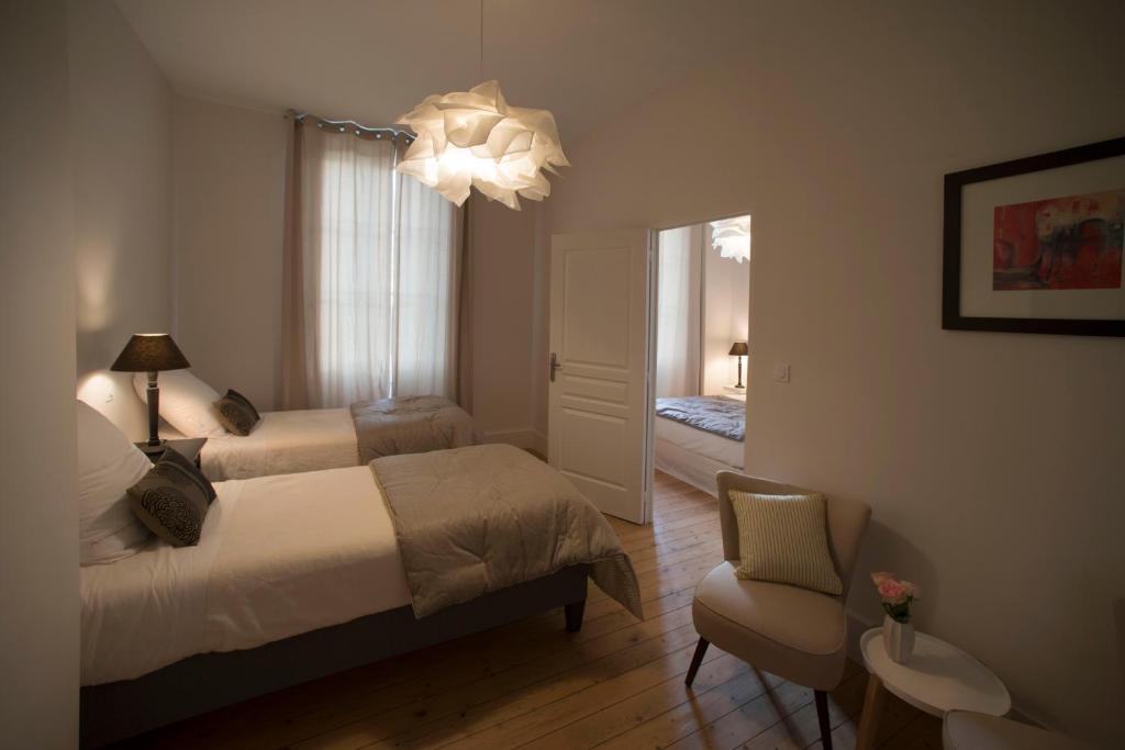Le Cercle Chambres climatisées - Chambre Familiale Avec Vue Sur Jardin
