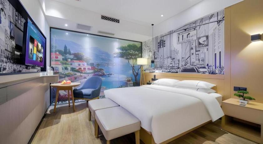 Postel nebo postele na pokoji v ubytování City Comfort Inn Chongqing Jiangbei International Airport