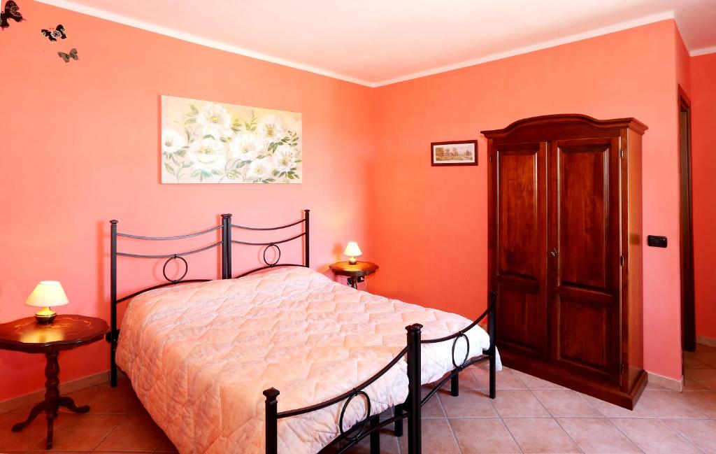 Postel nebo postele na pokoji v ubytování Agriturismo Al Brich