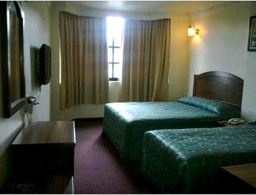 Postel nebo postele na pokoji v ubytování Hotel Remix