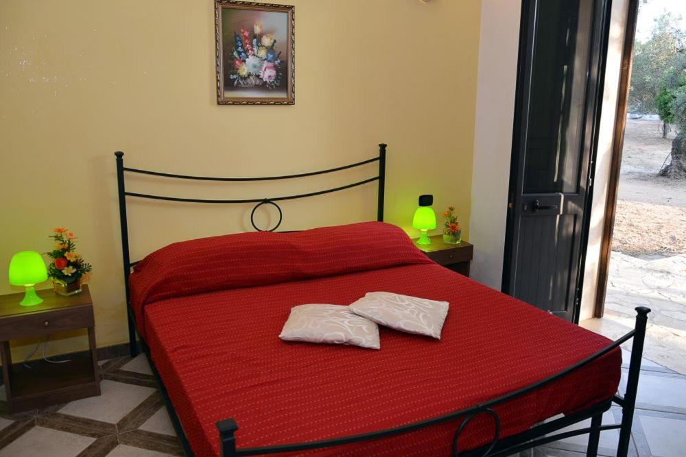 Postel nebo postele na pokoji v ubytování Agriturismo Molle