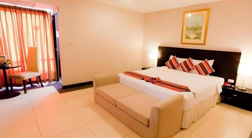 Postel nebo postele na pokoji v ubytování The Residence Airport & Spa Hotel