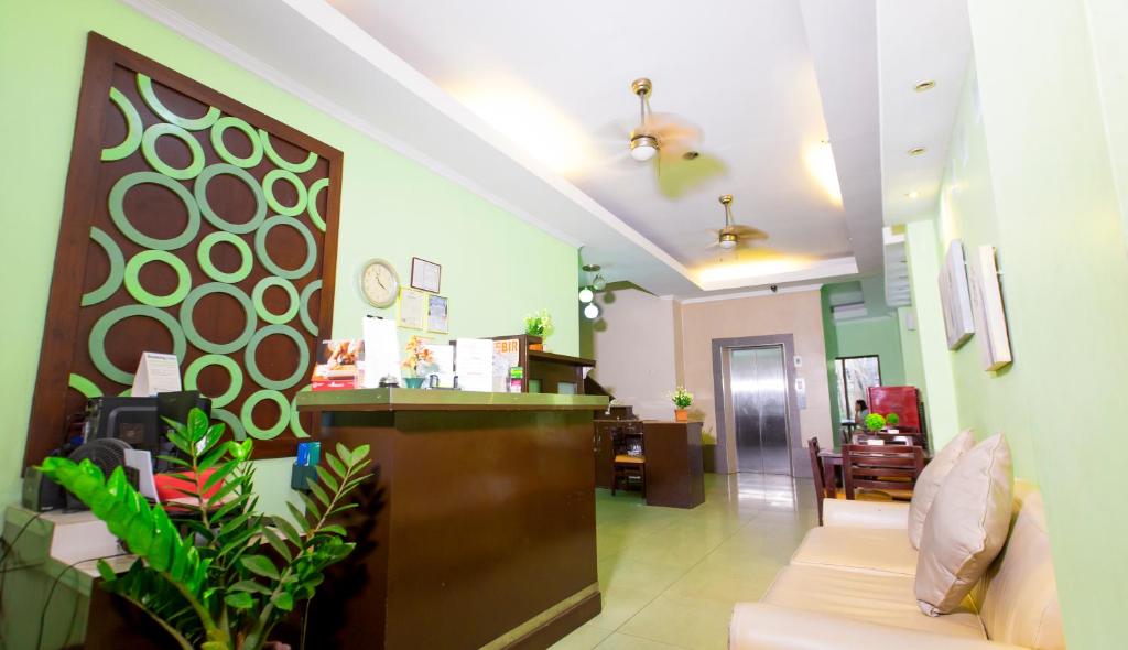 a lobby with a waiting room and a lobby at One Lourdes Dormitel in Iloilo City