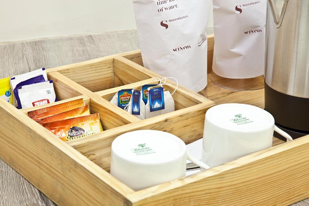 Příslušenství pro přípravu čaje a kávy v ubytování Scenaria Hotel
