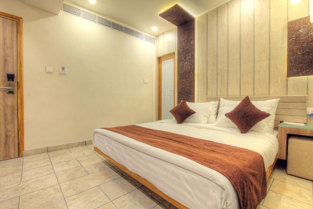 Postel nebo postele na pokoji v ubytování Scenaria Hotel