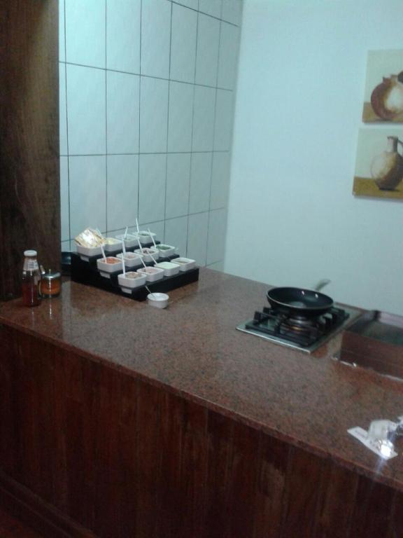 Kuchyň nebo kuchyňský kout v ubytování Hotel Inter Chimoio