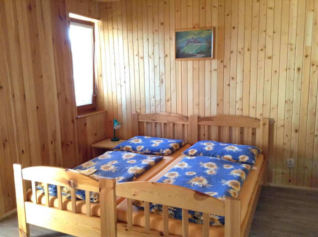 Postel nebo postele na pokoji v ubytování Penzion Jendrál
