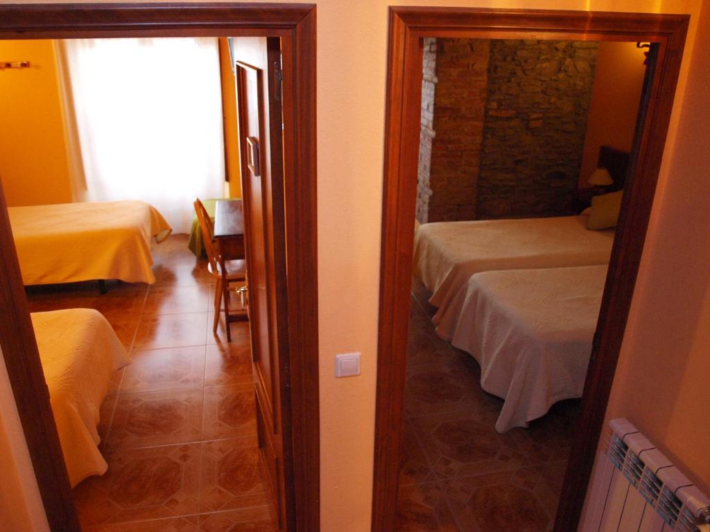 Postel nebo postele na pokoji v ubytování Cal Reus