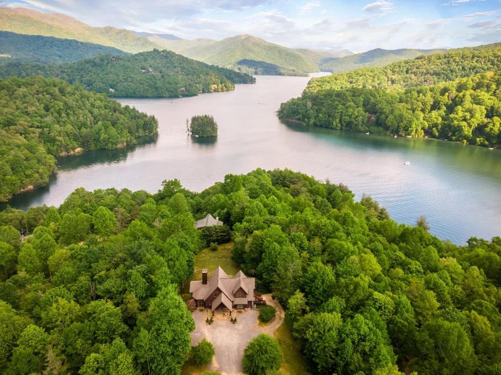 an aerial view of a house on a river at Modern Cabin, Secluded, Views, Lake, Private Dock, WIFI in Topton