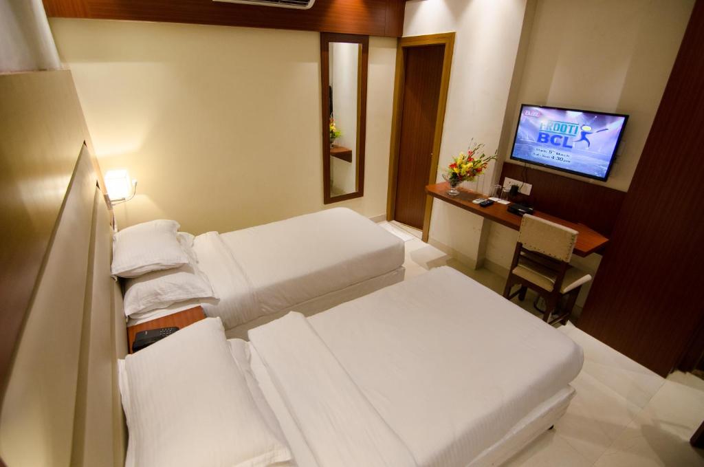 TV a/nebo společenská místnost v ubytování Aura hotel