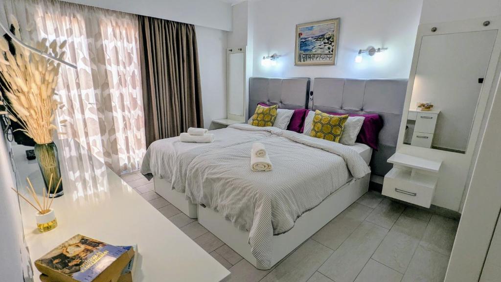 Voodi või voodid majutusasutuse Modern Apt near Beach&Pool Coastal Sunset Tenerife toas