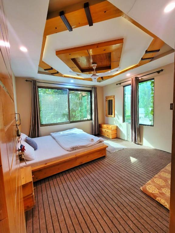 Llit o llits en una habitació de HIKK Inn