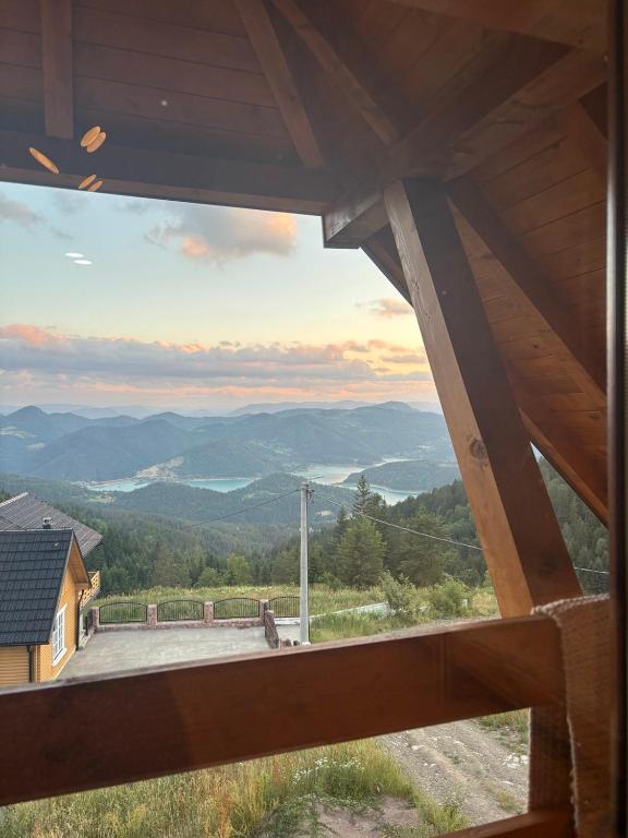 a view of the mountains from a cabin window at Vijogor kod Plavog in Sekulić 