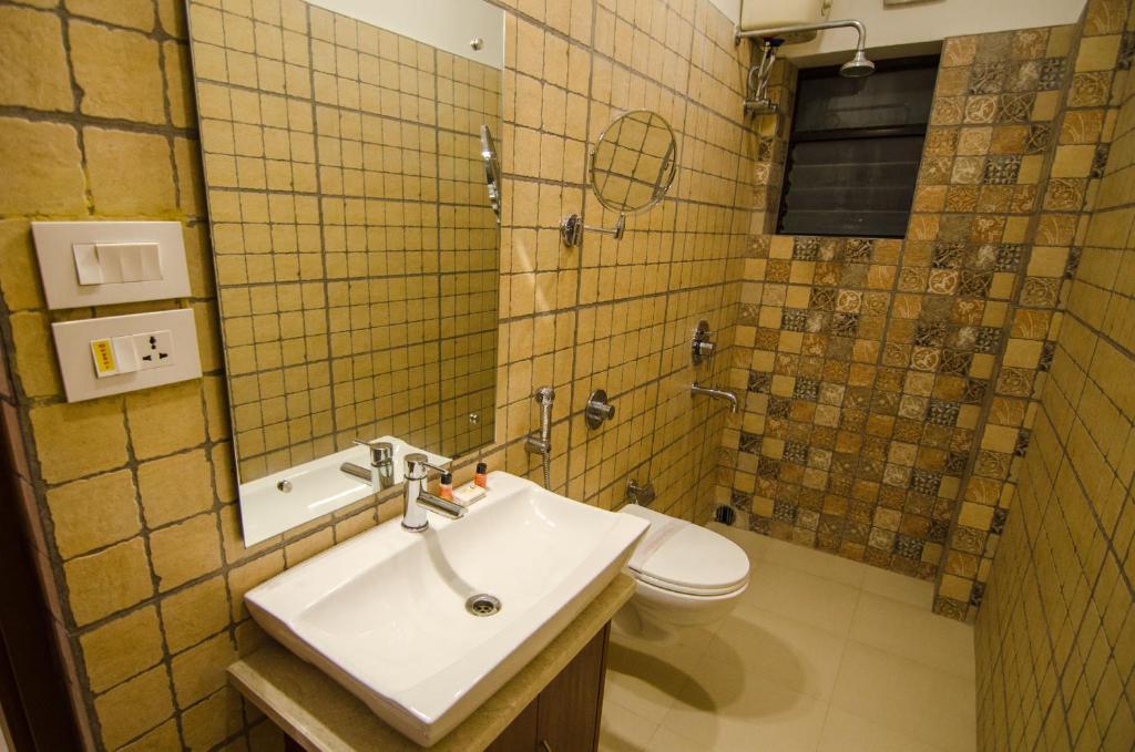 Koupelna v ubytování Aura hotel