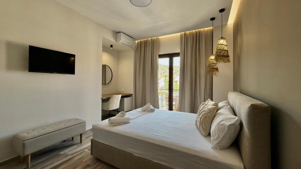 Postel nebo postele na pokoji v ubytování Hotel Eleni