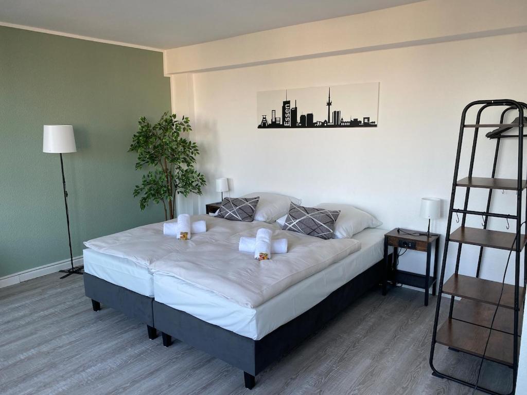 Ένα ή περισσότερα κρεβάτια σε δωμάτιο στο City Appartment