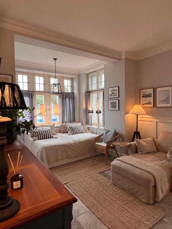 En eller flere senge i et værelse på SeeBlick Apt 7 Bałtyk Luxury Residence