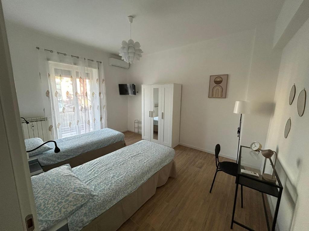 Postel nebo postele na pokoji v ubytování Casa Susanna