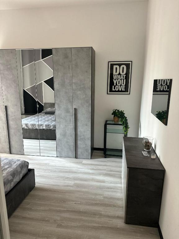 Llit o llits en una habitació de VSuite Linate