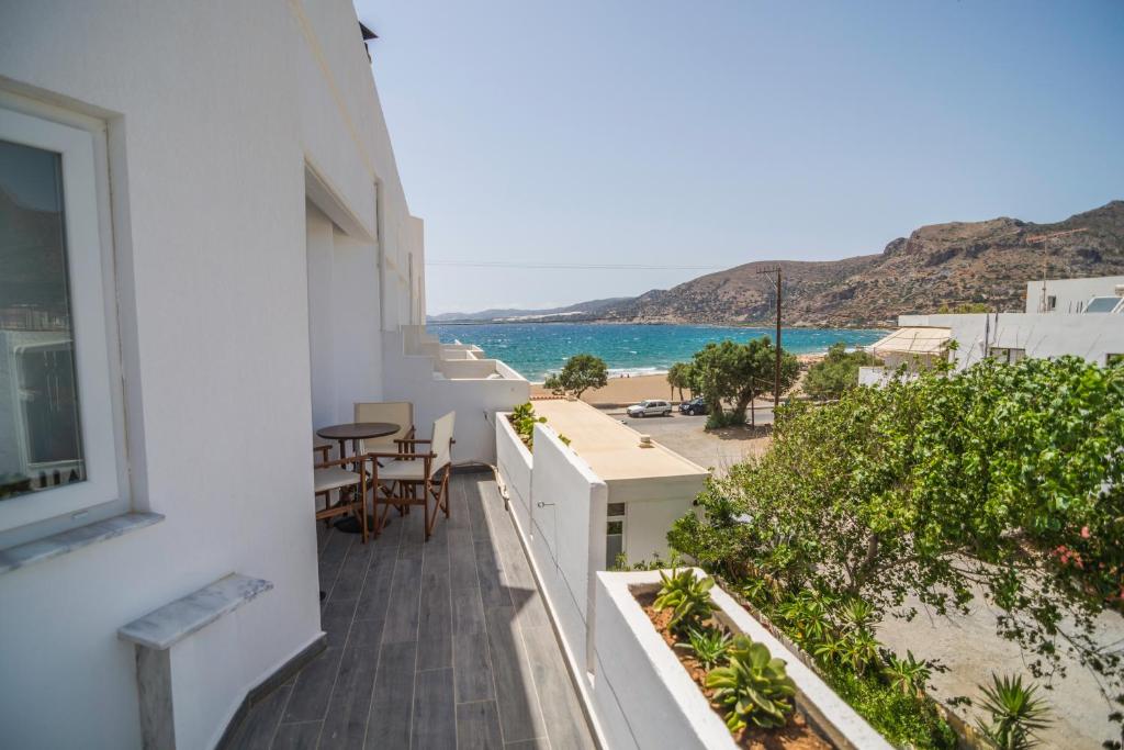 a balcony with a view of the ocean at Pal Beach in Palaiochora