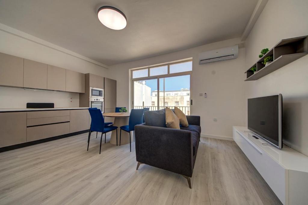 Η κουζίνα ή μικρή κουζίνα στο Luxurious Apartment steps from Spinola Bay