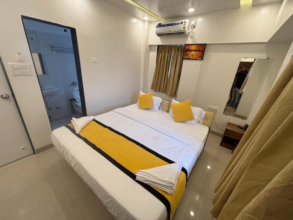 Postel nebo postele na pokoji v ubytování Atithi Home Stay