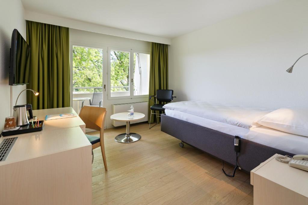 TV a/nebo společenská místnost v ubytování VitalBoutique Hotel Zurzacherhof