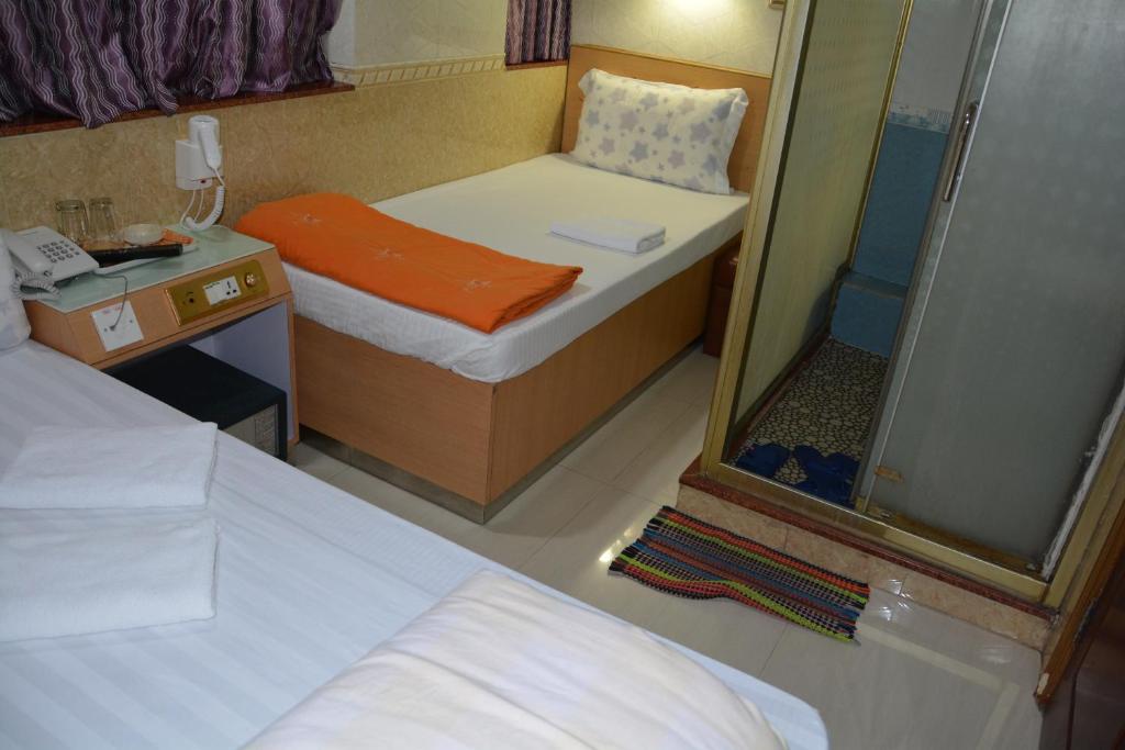 Postel nebo postele na pokoji v ubytování Everest Guest House