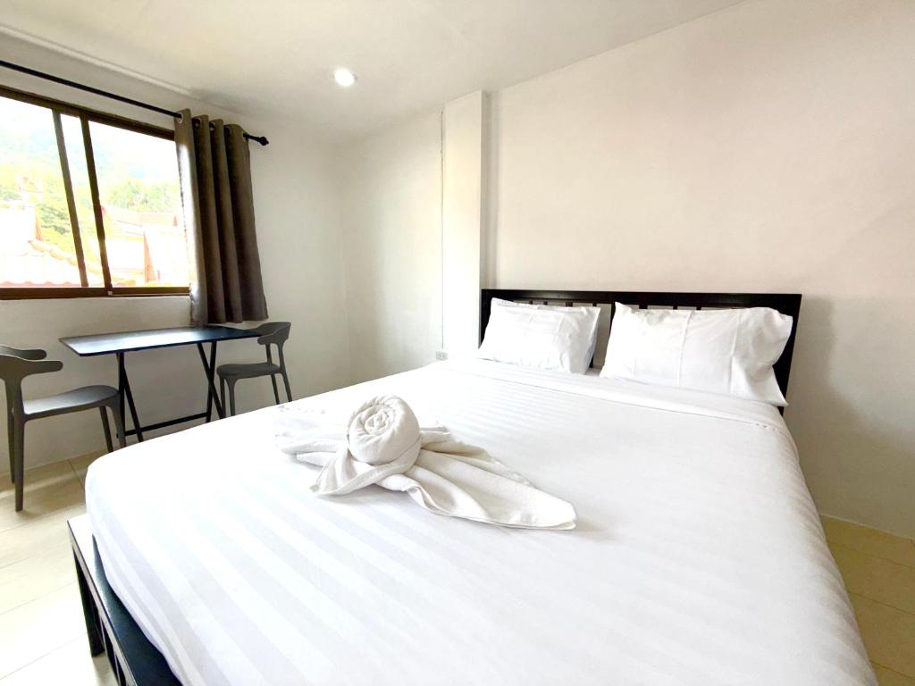 En eller flere senge i et værelse på Patong Canal Villa 205