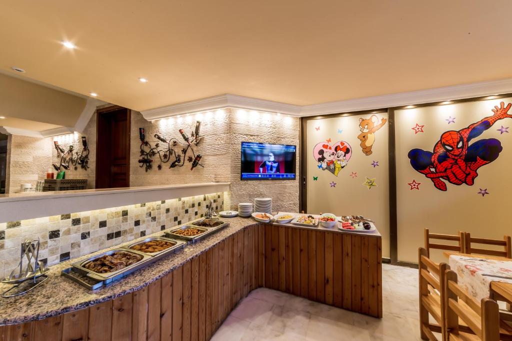 TV a/nebo společenská místnost v ubytování Hotel Aqua