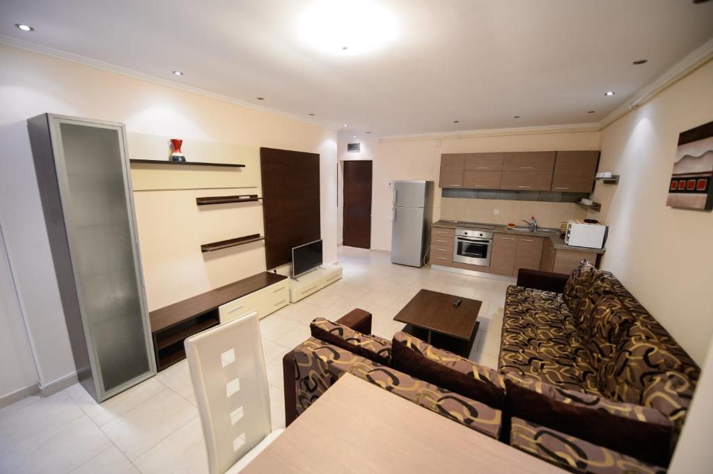 Kuchyň nebo kuchyňský kout v ubytování Holiday Olimp Hotel